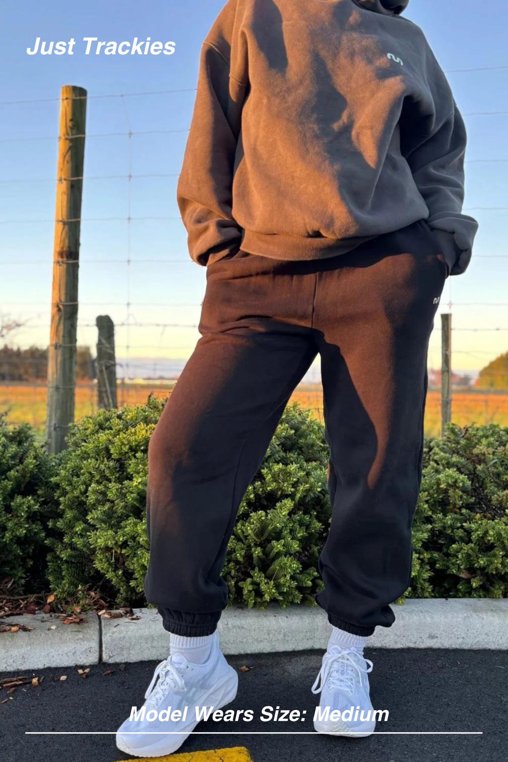 Mint Activewear Just Trackies in chocolate brown, full-length front view paired with a matching hoodie outdoors.