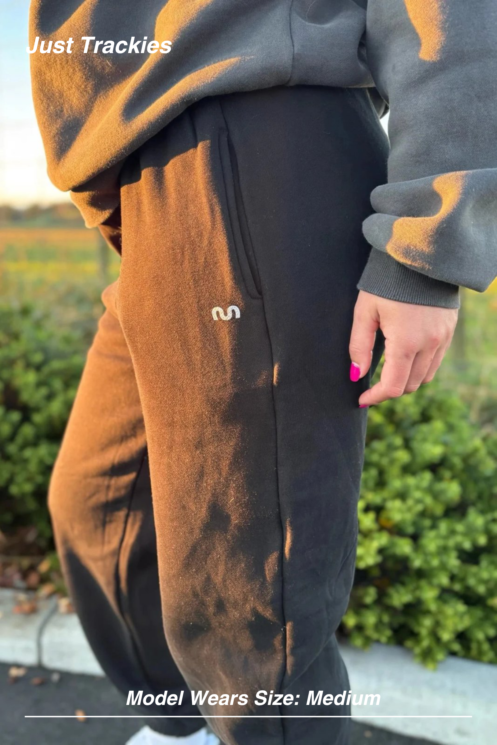 Mint Activewear Just Trackies in chocolate brown, side close-up of the embroidered logo and pocket detail.
