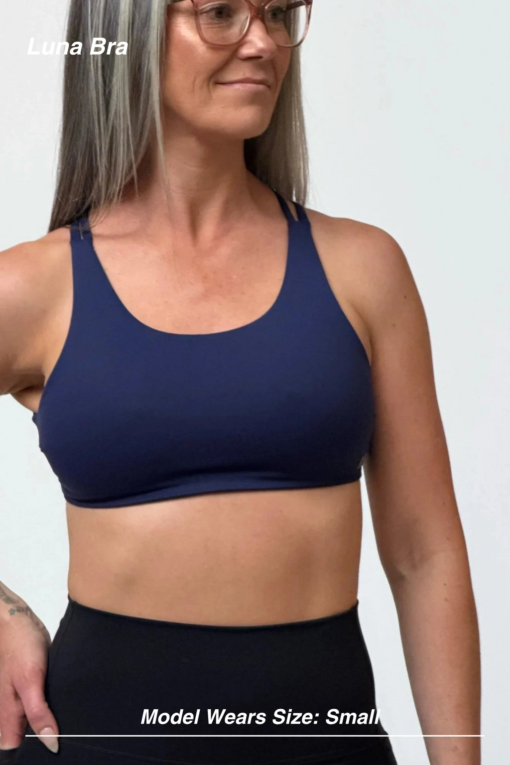Mint Activewear Luna Bra in navy, front close-up showing the clean scoop neckline and plain front.