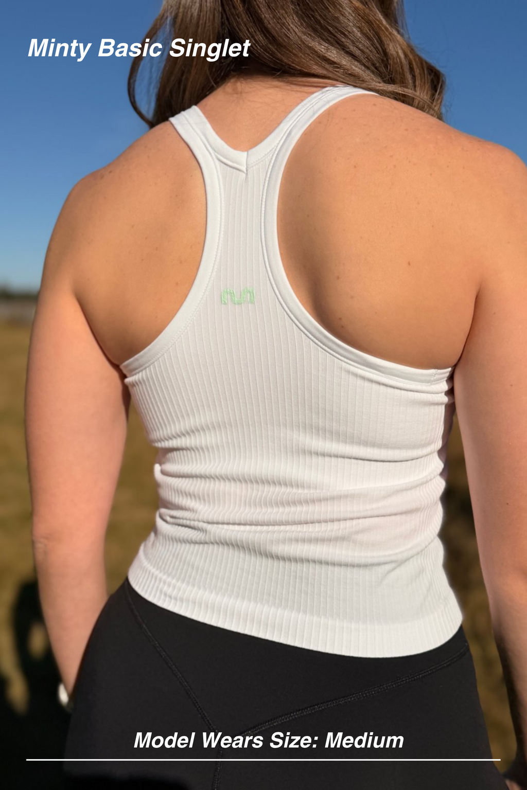 Mint Activewear Minty Basic Singlet in white, back view showing the ribbed racerback and fitted seamless fabric.