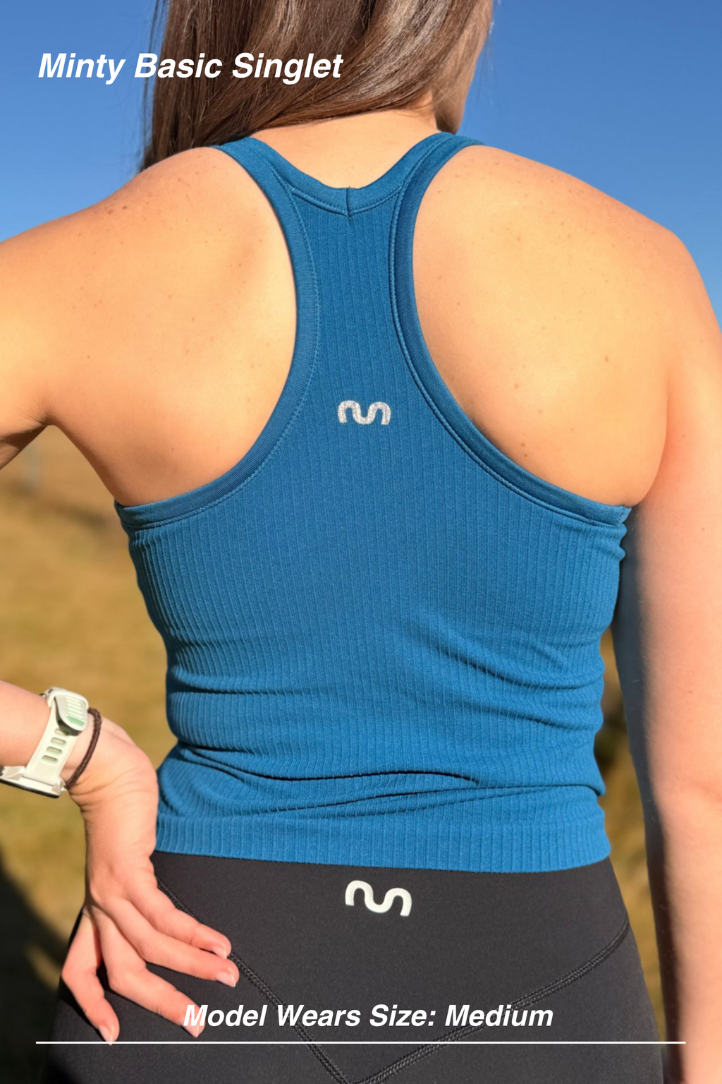 Mint Activewear Minty Basic Singlet in blue, back view showing the racerback straps and ribbed sculpting fabric.