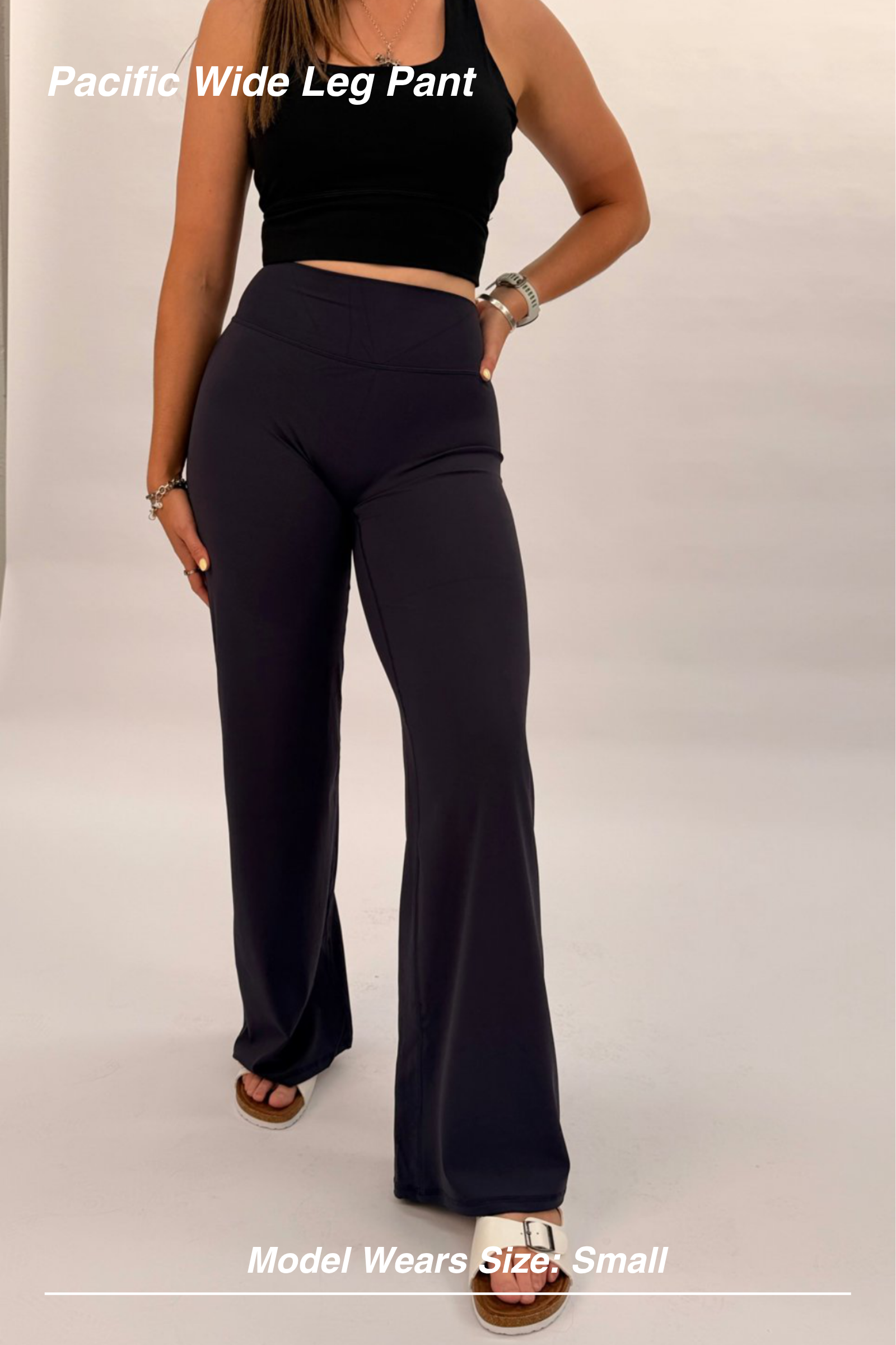Mint Activewear Pacific Wide Leg Pant in navy, front view showing the high waistband and elongated wide-leg drape.