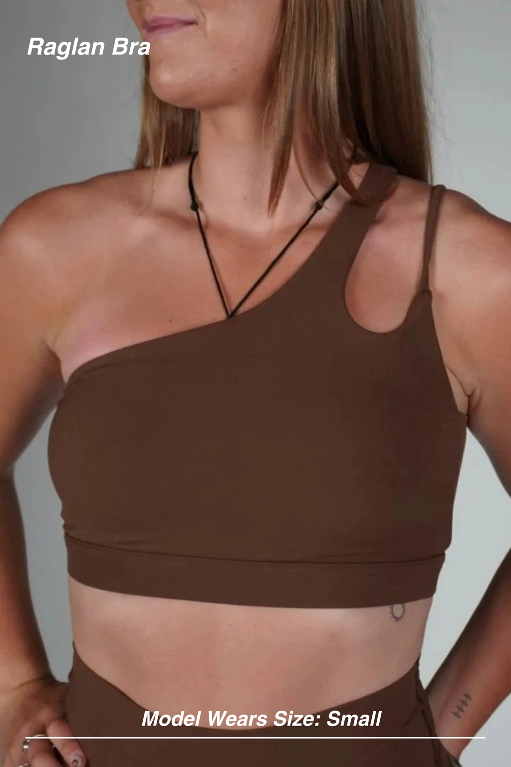 Mint Activewear Raglan Bra in Chocolate, front view showing the single shoulder strap and cut-out detail.