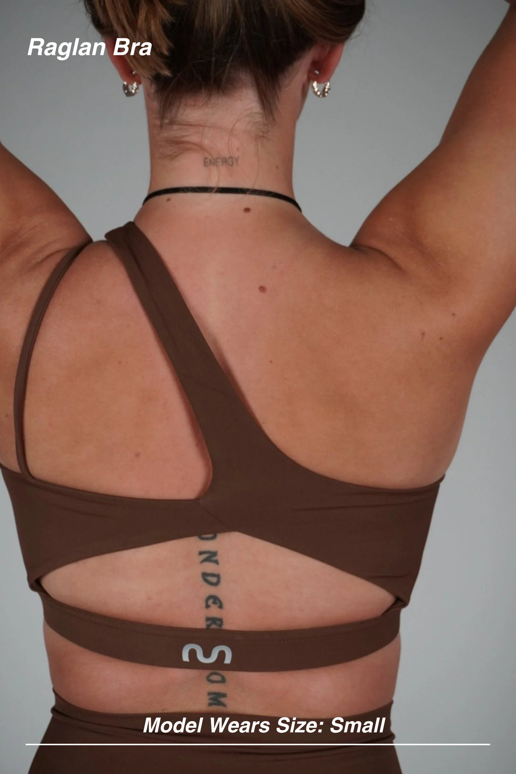 Mint Activewear Raglan Bra in Chocolate, back view with crossed straps and an open cut-out band.